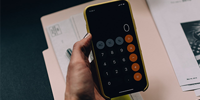Calculator being used on mobile phone photo Unsplash
