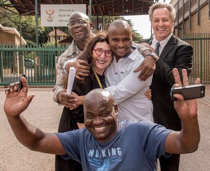 (Back) Victor Moyo, Wits Justice Project's Carolyn Raphaely, Sampie Khanye and lawyer Egon Oswald. (Front) Thembekile Molaudzi. ? Carolyn Raphaely_WJP