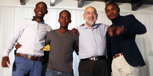 Professor Barry Dwolatzky with the three winners Methembe Dlamini (2), Thapelo Sekwena (1) and Absalom Mpanze (3)