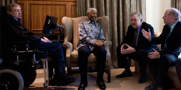 Professor Stephen Hawking meeting with former President Nelson Mandela, former foreign affairs minister Pik Botha, and Professor David Block from Wits University in 2008. ? Nelson Mandela Foundation