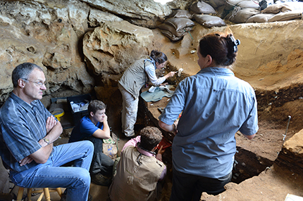 rofessor Chris Henshilwood and his team working behind the scenes in Blombos Cave in South Africas southern Cape, where the drawing was found. Credit: Ole Frederik Unhammer