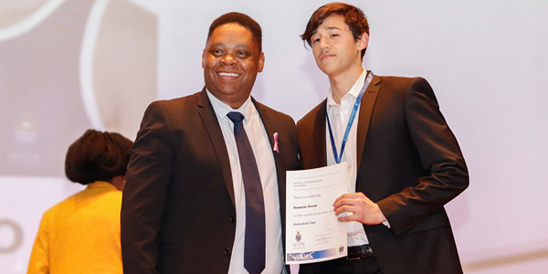 Jerome-September, Dean of Student Affairs and electrical engineering student and athlete, Romario Ferrao at the 2019 Wits Sports Awards.